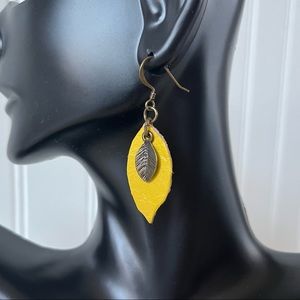 2/$25 Leather & brass yellow leaf earrings